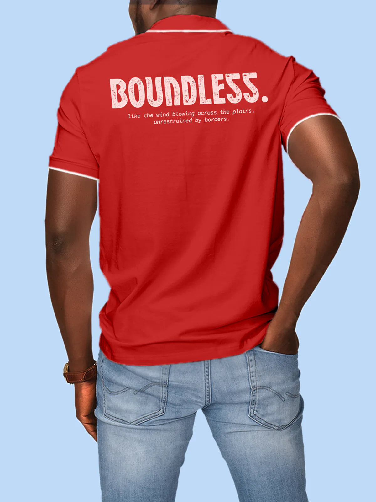 Fighterhero Polos: Model wearing Men's Red Polo T-shirt with 'Free & Boundless' design
