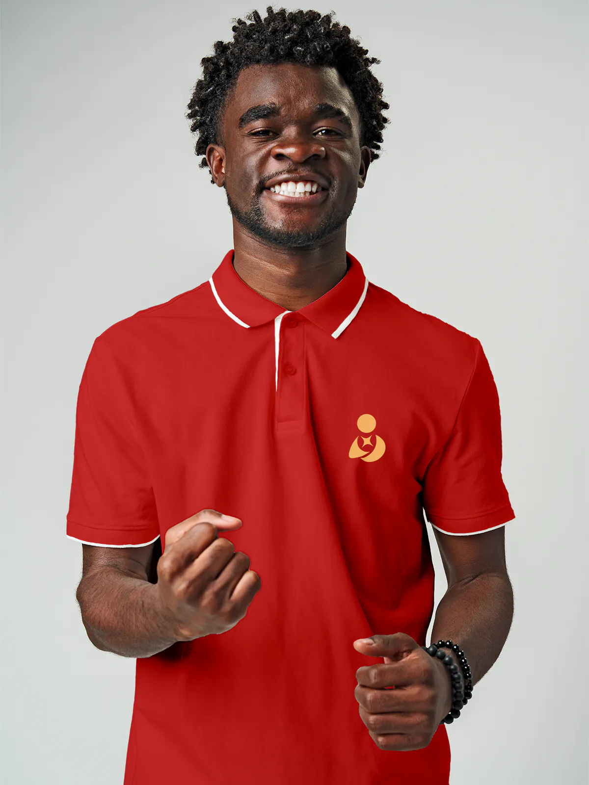 Close up of 'Free & Boundless' design on Men's Red Collar T-shirt, highlighting intricate details and vibrant print.