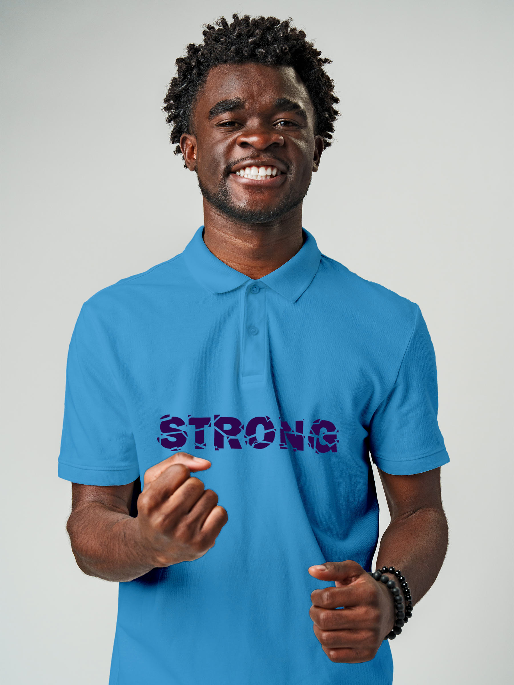 Model wearing Men's Blue Polo T-shirt with 'Strong' design, offering effortless style and premium comfort