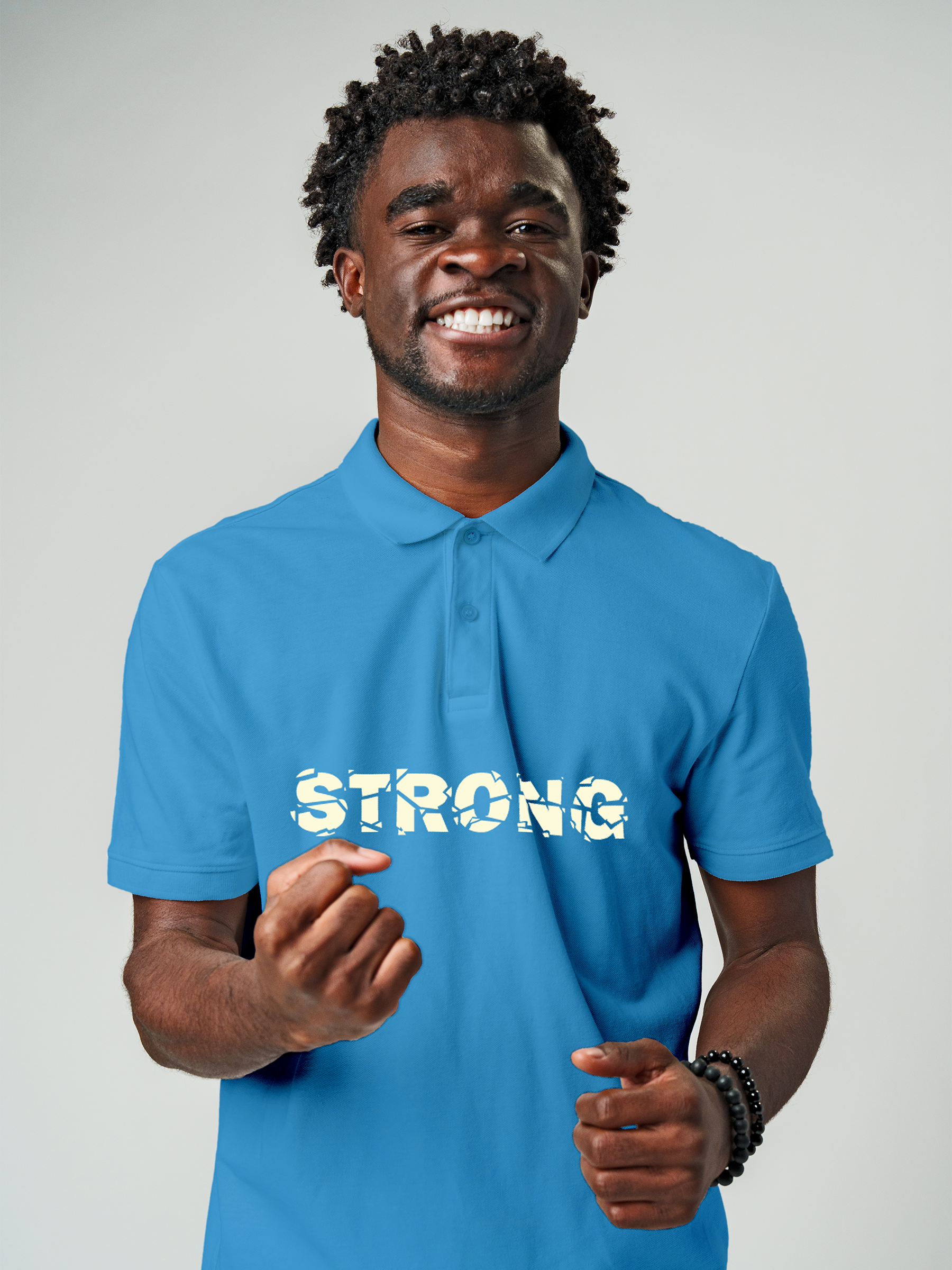 Model wearing Men's Blue Polo T-shirt with 'Strong' design, offering effortless style and premium comfort