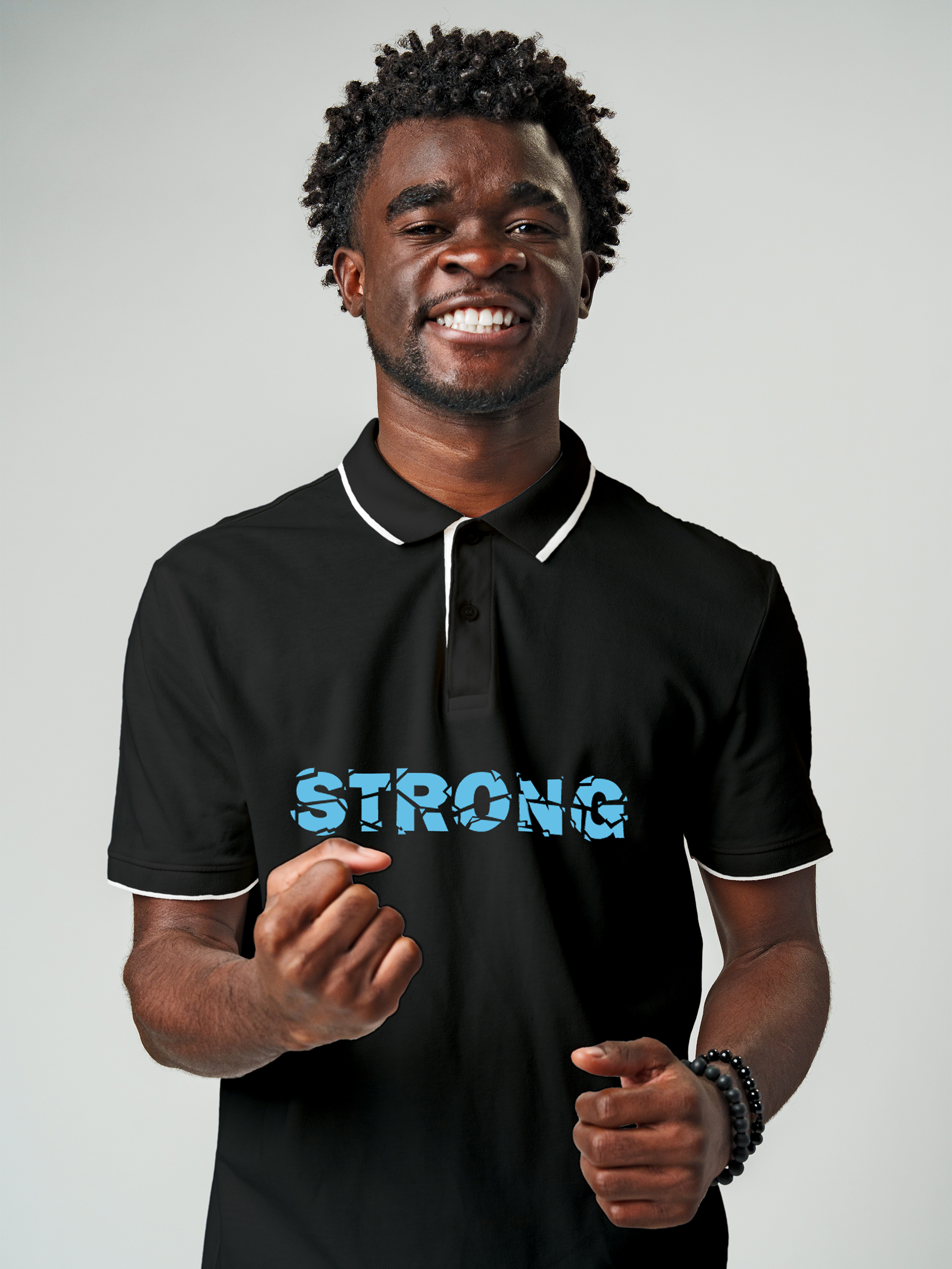 Fighterhero Polo Collection: Model wearing Men's Charcoal Grey Polo T-shirt with 'Strong' design