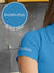 Close up of 'Boundless' print on the sleeve of Women's Blue Collar T-shirt, highlighting the vibrant print.