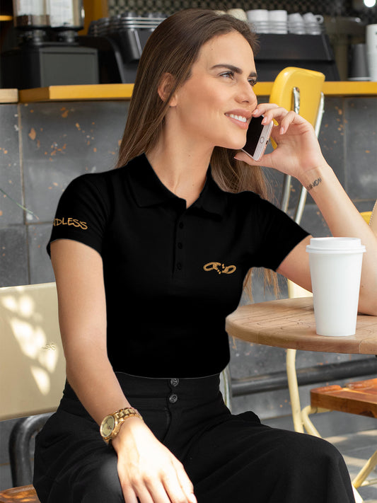 Model wearing Women's Black Polo T-shirt with 'Boundless' design, offering effortless style and premium comfort