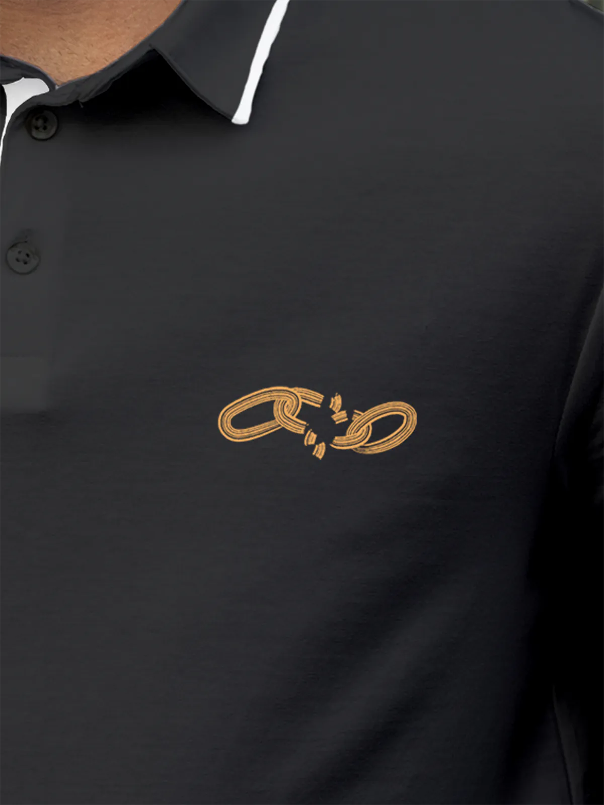 Close up of 'Boundless' design on Men's Dark Grey Collar T-shirt, highlighting intricate details and vibrant print.