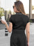 Back view of Fighterhero Women's Dark Grey Polo T-shirt with 'Boundless' design, highlighting the modern look and clean finish