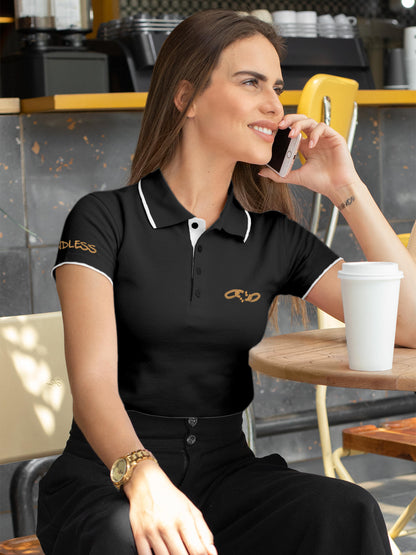 Model wearing Women's Dark Grey Polo T-shirt with 'Boundless' design, offering effortless style and premium comfort