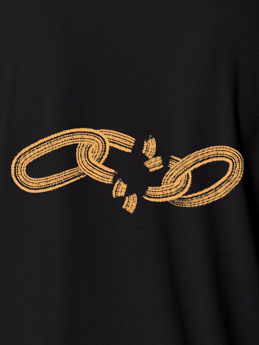 Close up of 'Boundless' design on Women's Dark Grey Polo T-shirt, highlighting intricate details and vibrant print.