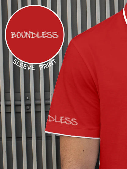 Close up of 'Boundless' print on the sleeve of Men's Red Collar T-shirt, highlighting the vibrant print.