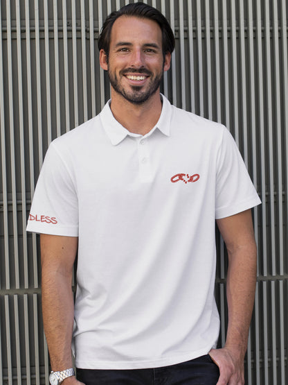 Model wearing Men's White Polo T-shirt with 'Boundless' design, offering effortless style and premium comfort