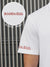 Close up of 'Boundless' print on the sleeve of Men's White Collar T-shirt, highlighting the vibrant print.