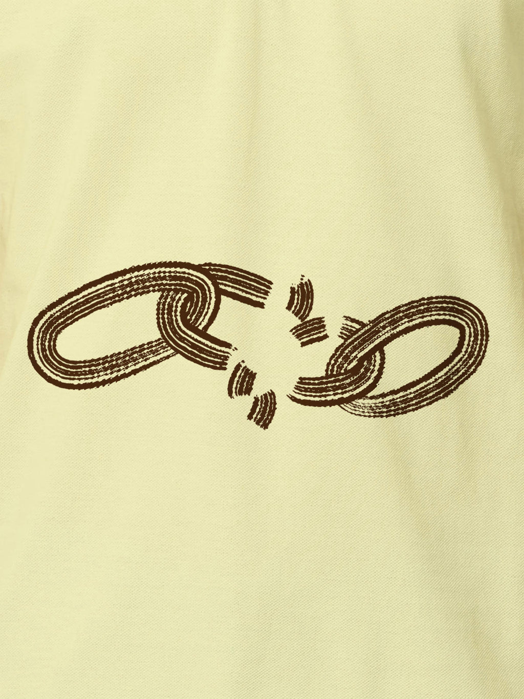 Close up of 'Boundless' design on Men's Yellow Polo T-shirt, highlighting intricate details and vibrant print.