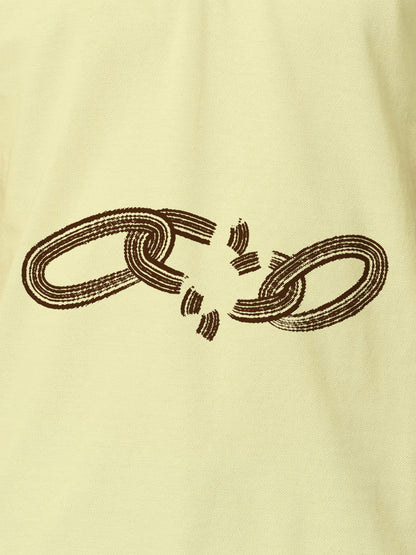 Close up of 'Boundless' design on Men's Yellow Polo T-shirt, highlighting intricate details and vibrant print.