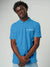 Close up of 'Focus' design on Men's Blue Collar T-shirt, highlighting intricate details and vibrant print.