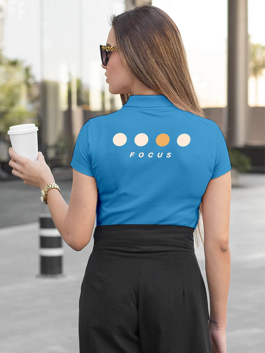Fighterhero Polos: Model wearing Women's Blue Polo T-shirt with 'Focus' design
