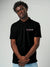 Close up of 'Focus' design on Men's Black Collar T-shirt, highlighting intricate details and vibrant print.