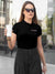 Close up of 'Focus' design on Women's Black Collar T-shirt, highlighting intricate details and vibrant print.
