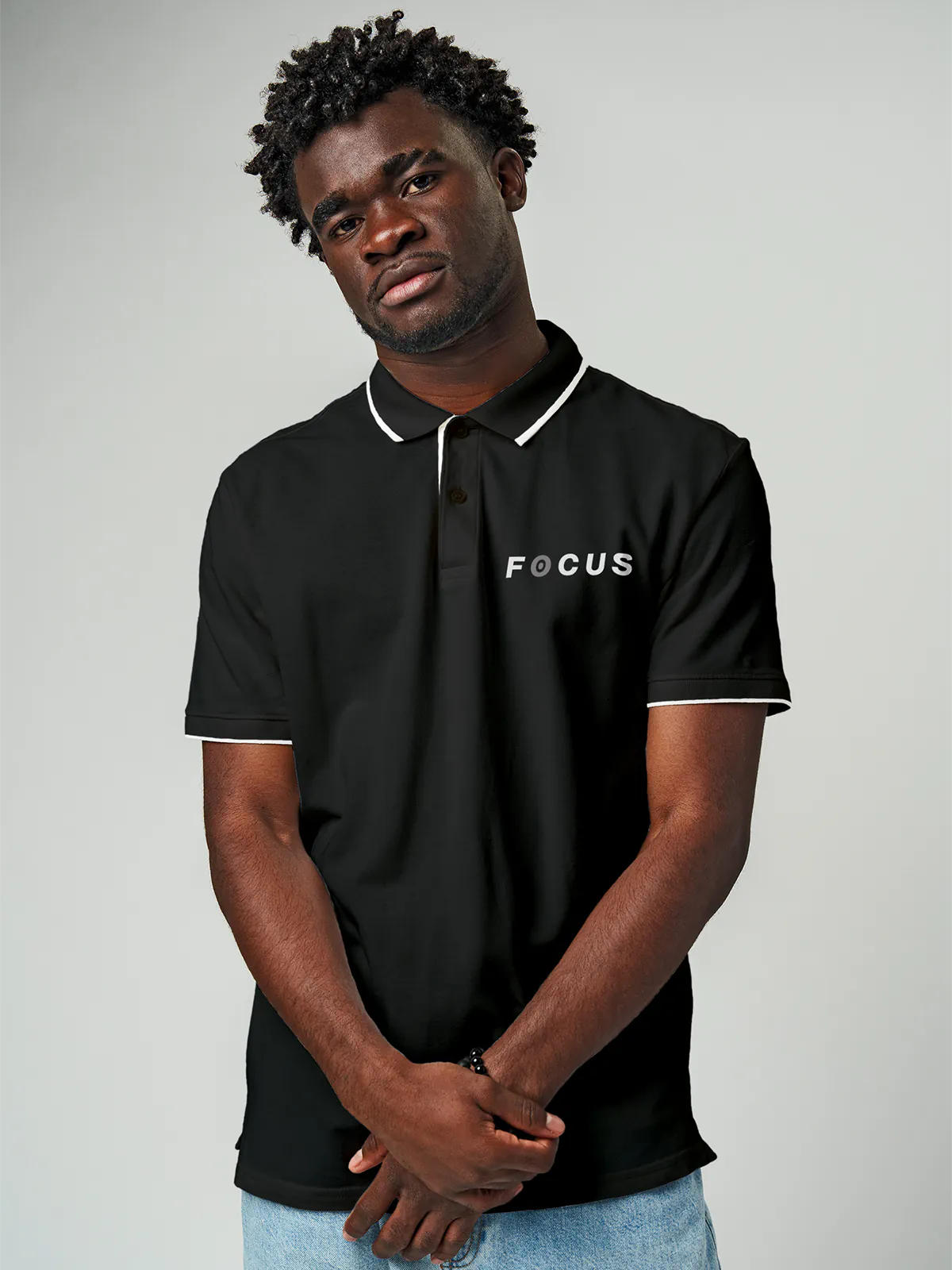Close up of 'Focus' design on Men's Dark Grey Collar T-shirt, highlighting intricate details and vibrant print.