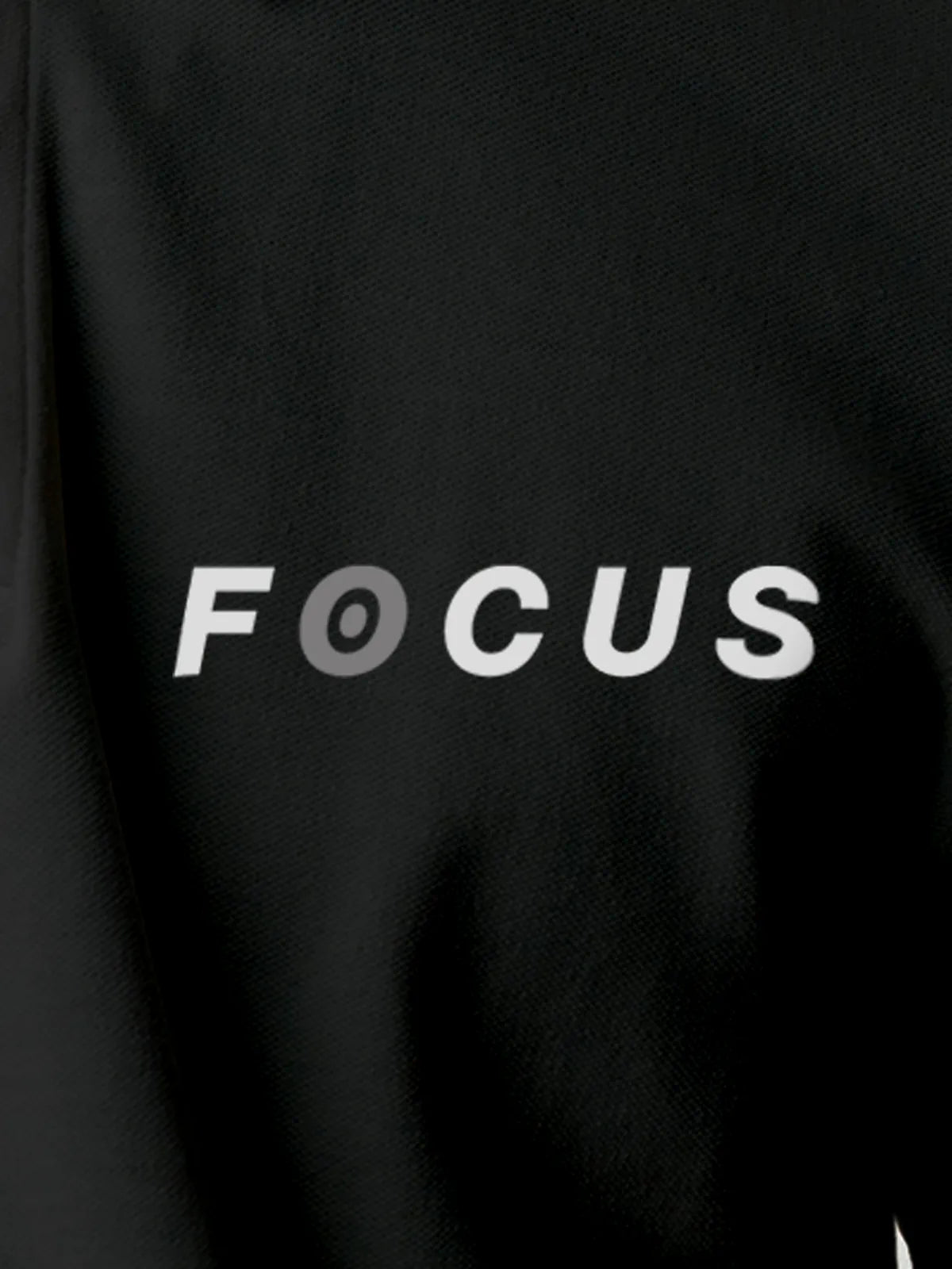 Close up of 'Focus' design on Men's Dark Grey Collar T-shirt, highlighting intricate details and vibrant print.