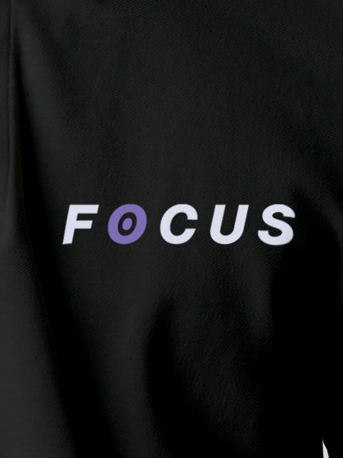 Close up of 'Focus' design on Men's Dark Grey Collar T-shirt, highlighting intricate details and vibrant print.