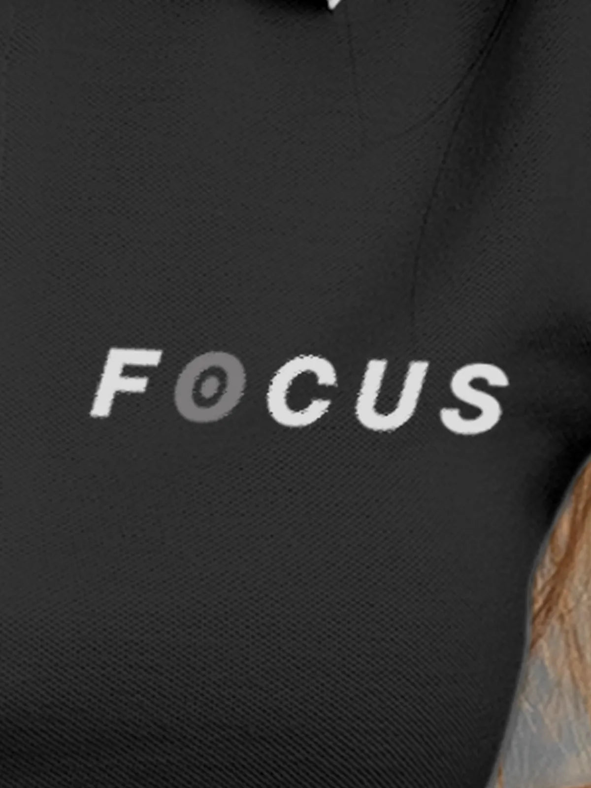 Close up of 'Focus' design on Women's Dark Grey Collar T-shirt, highlighting intricate details and vibrant print.