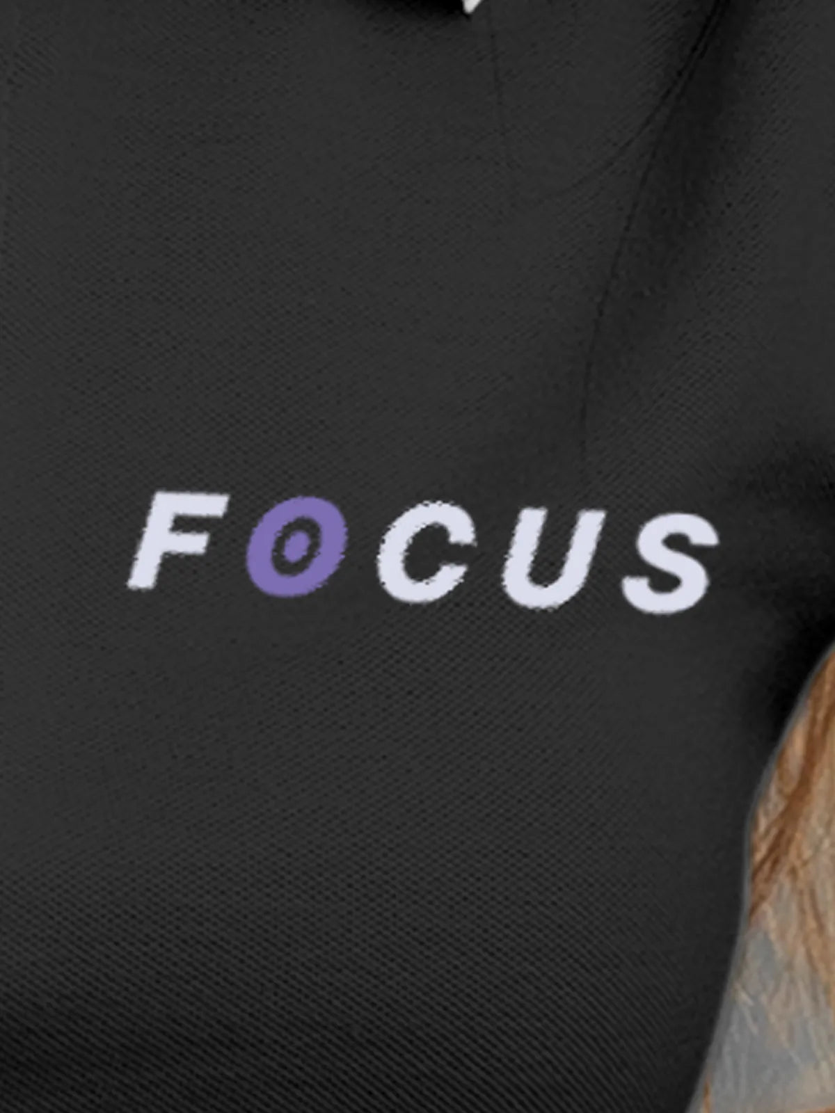 Close up of 'Focus' design on Women's Dark Grey Collar T-shirt, highlighting intricate details and vibrant print.