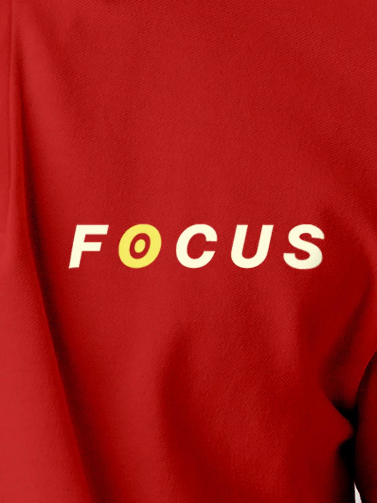 Close up of 'Focus' design on Men's Red Collar T-shirt, highlighting intricate details and vibrant print.