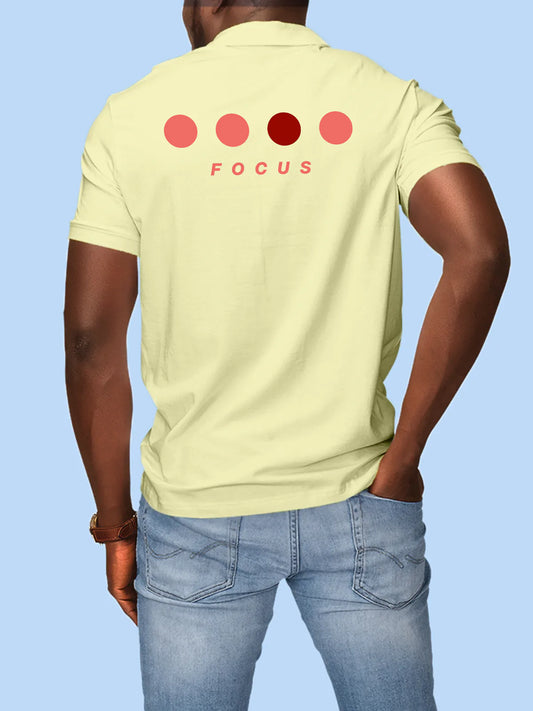 Fighterhero Polos: Model wearing Men's Yellow Polo T-shirt with 'Focus' design