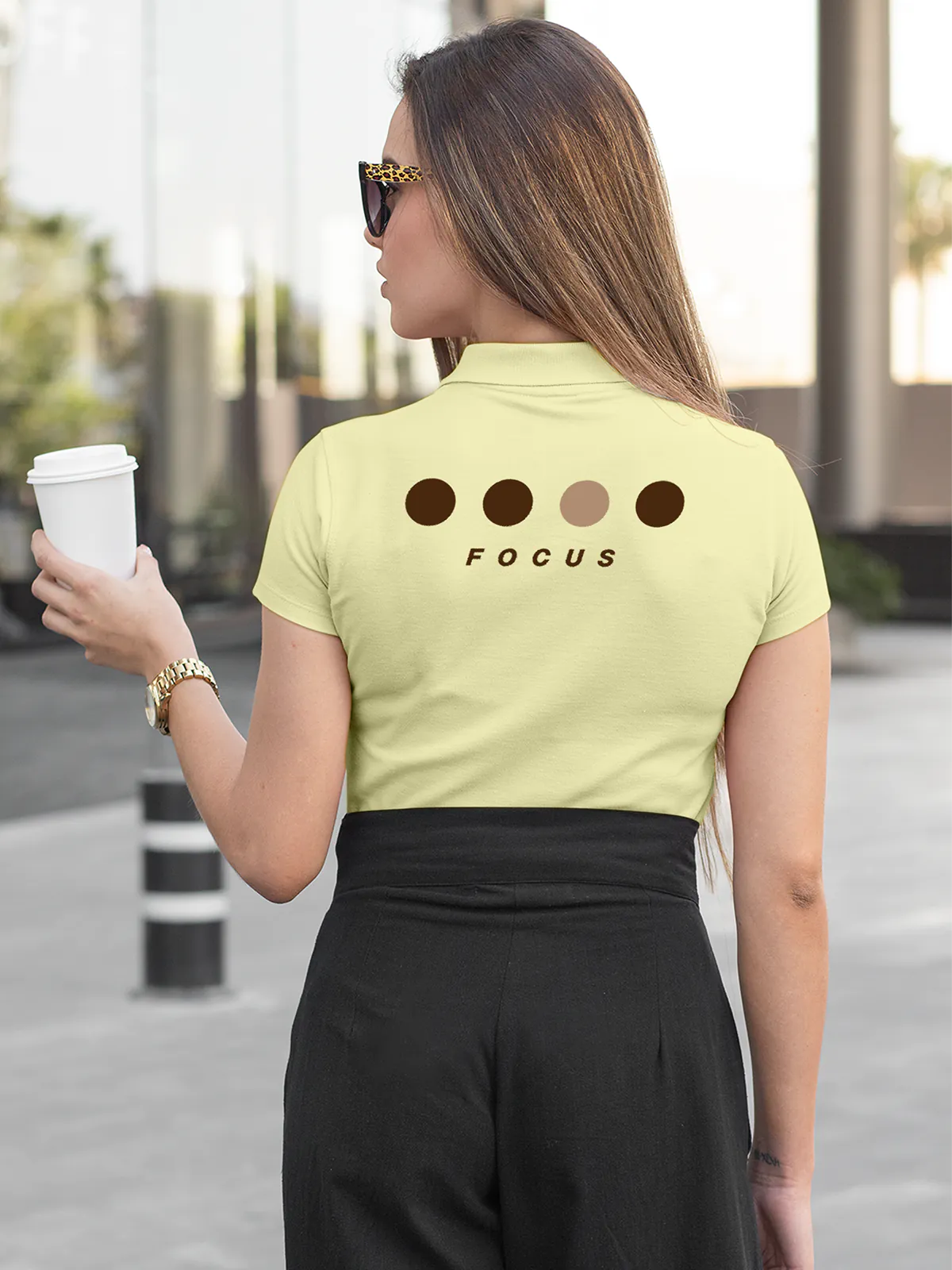 Model wearing Women's Yellow Collar T-shirt with 'Focus' design printed at the back.