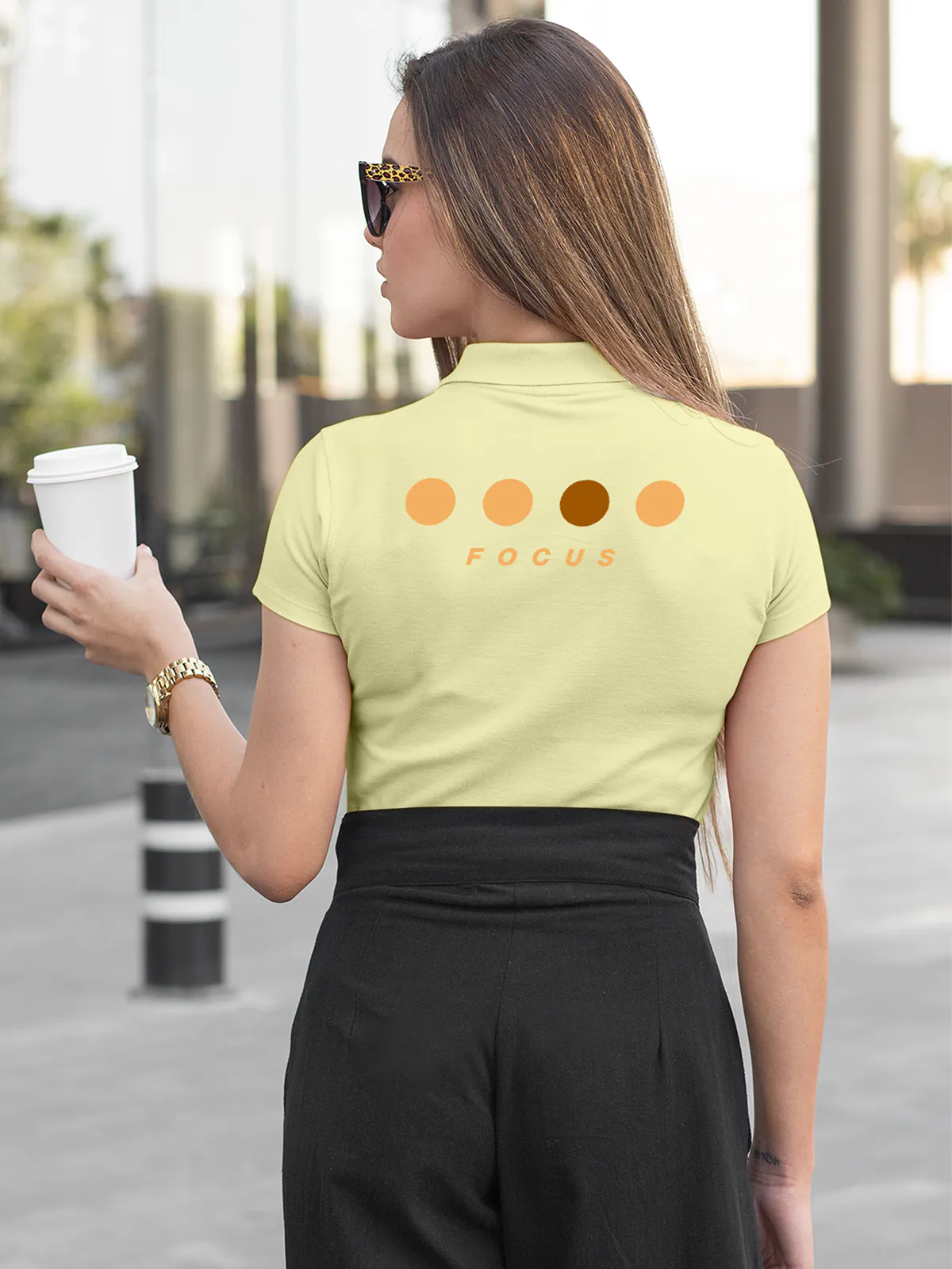 Model wearing Women's Yellow Collar T-shirt with 'Focus' design printed at the back.