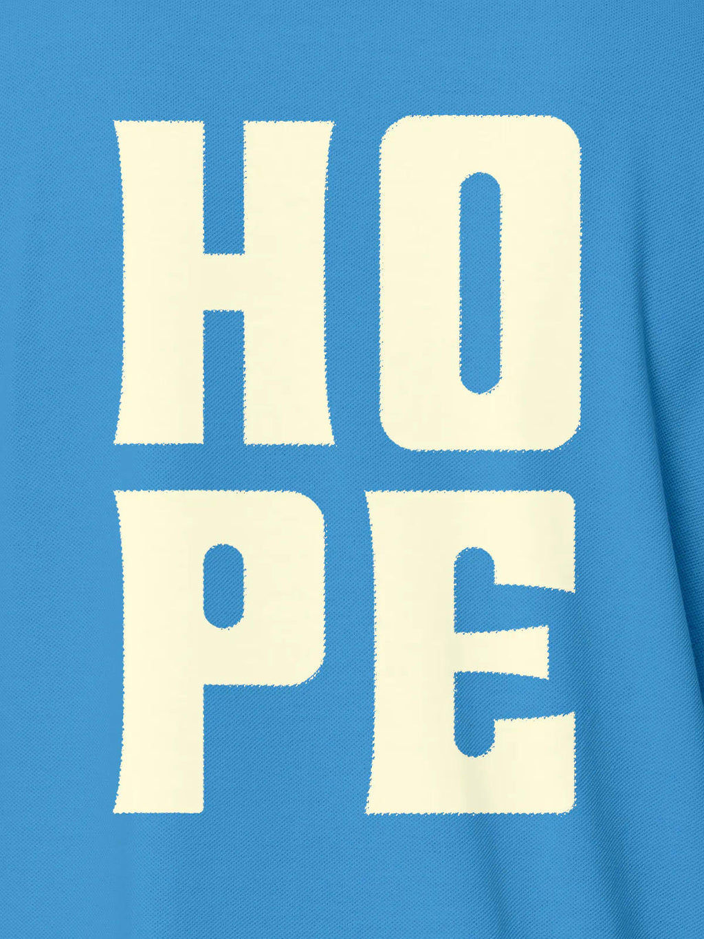Close up of 'Hope' design on Men's Blue Polo T-shirt, highlighting intricate details and vibrant print.