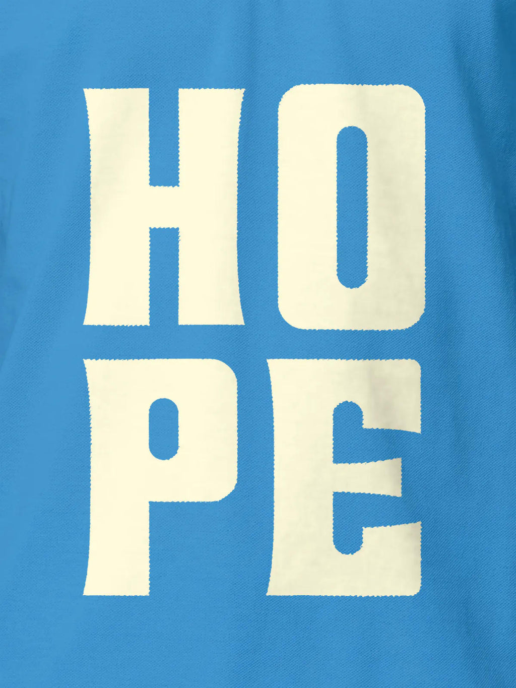 Close up of 'Hope' design on Women's Blue Polo T-shirt, highlighting intricate details and vibrant print.