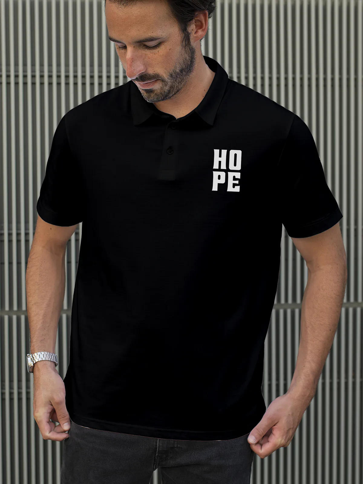 Model wearing Men's Black Polo T-shirt with 'Hope' design, offering effortless style and premium comfort