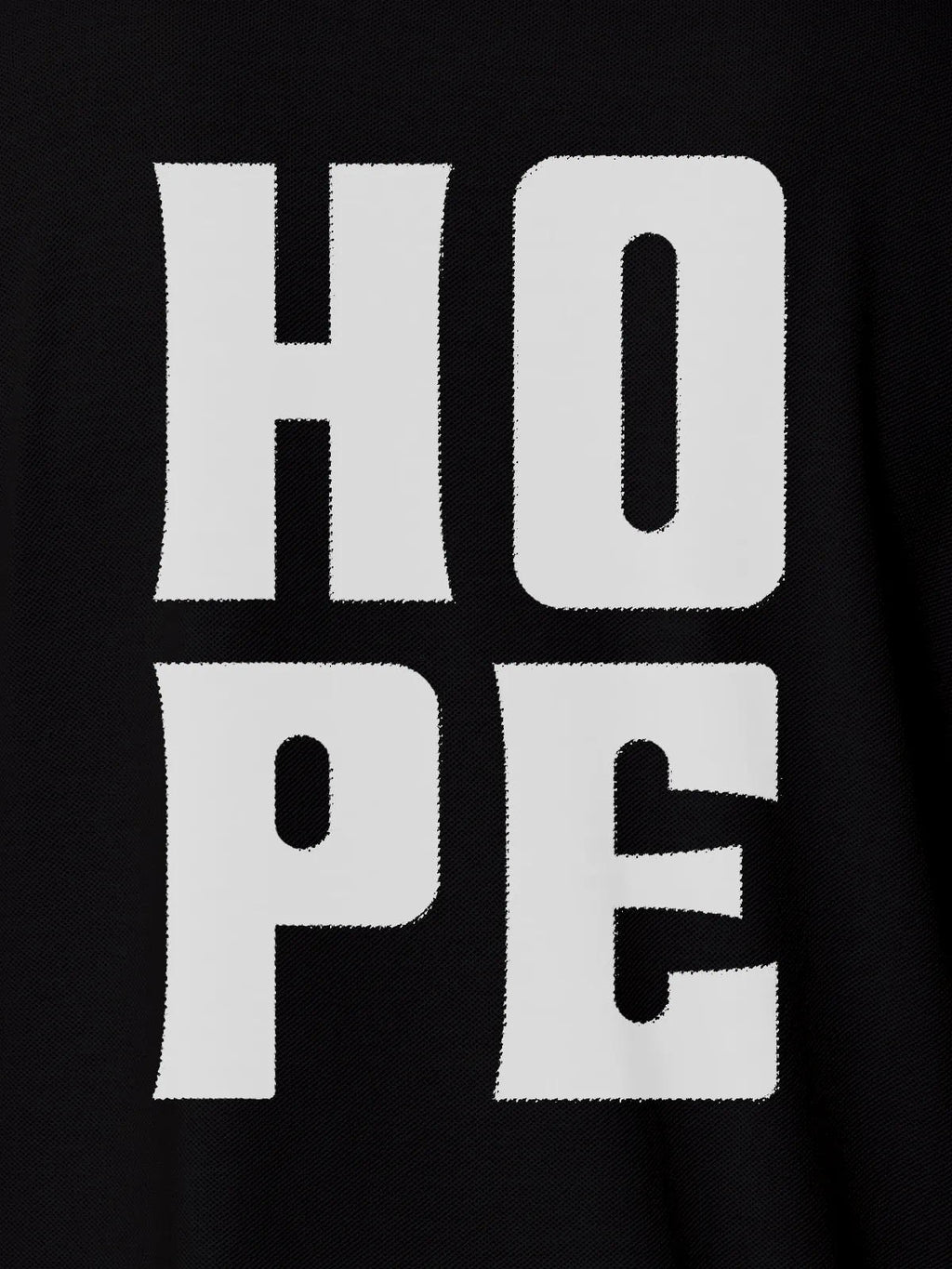 Close up of 'Hope' design on Men's Black Polo T-shirt, highlighting intricate details and vibrant print.
