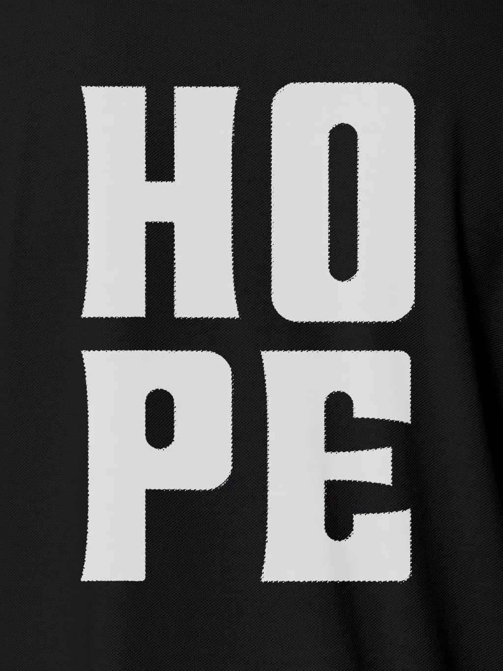 Close up of 'Hope' design on Men's Dark Grey Polo T-shirt, highlighting intricate details and vibrant print.