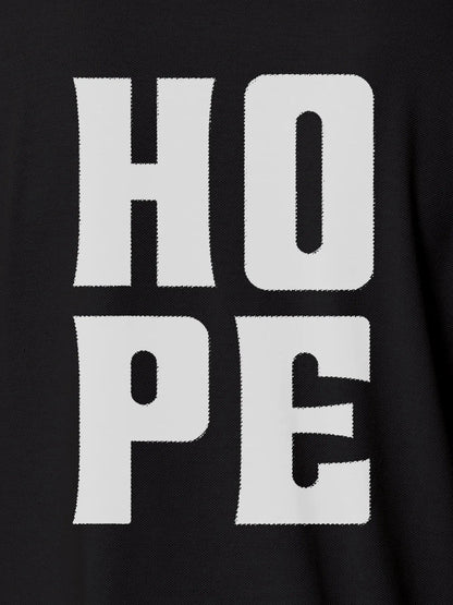 Close up of 'Hope' design on Men's Dark Grey Polo T-shirt, highlighting intricate details and vibrant print.