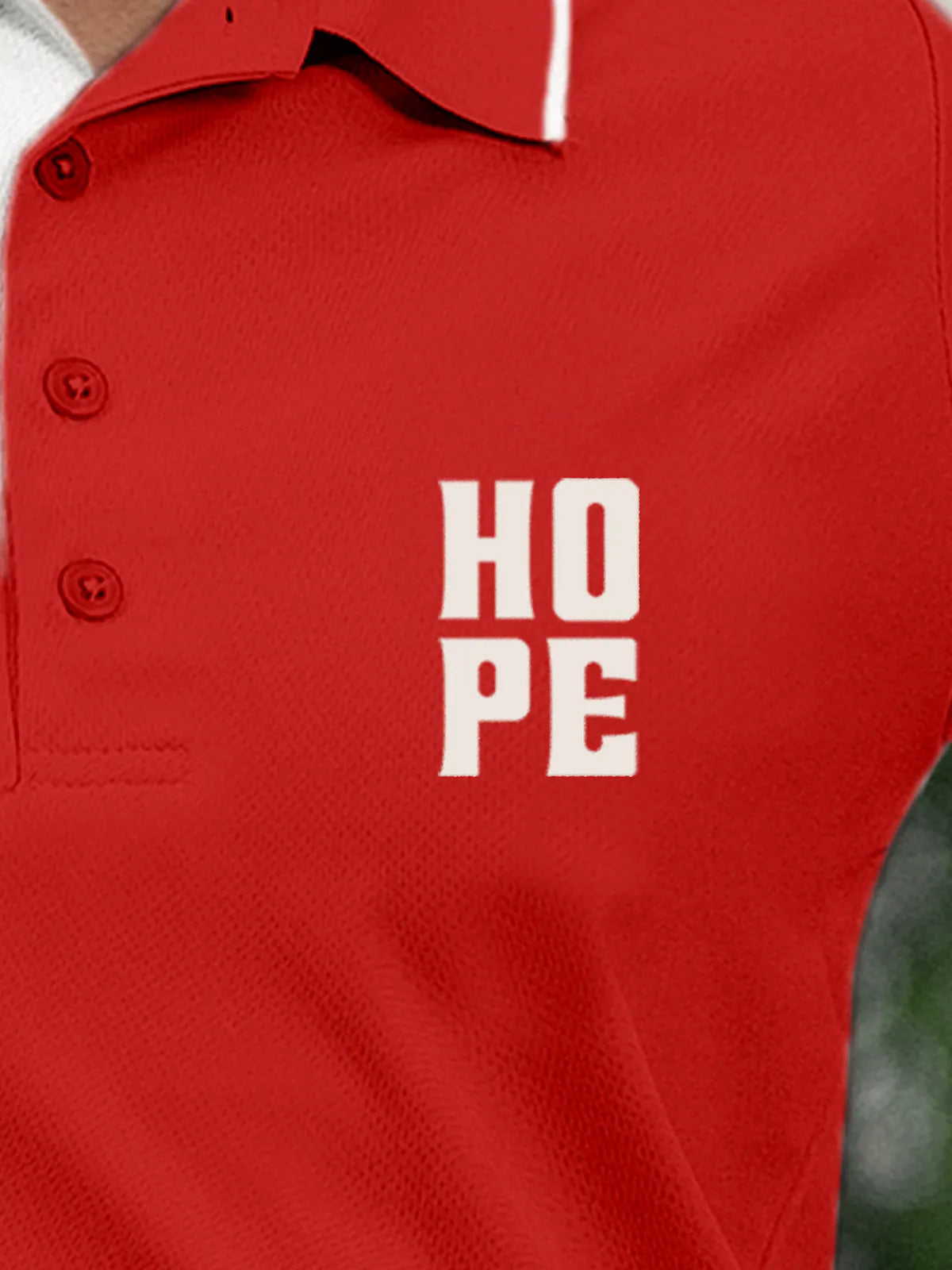 Close up of 'Hope' on Women's Red Polo T-shirt, highlighting intricate details and vibrant print.