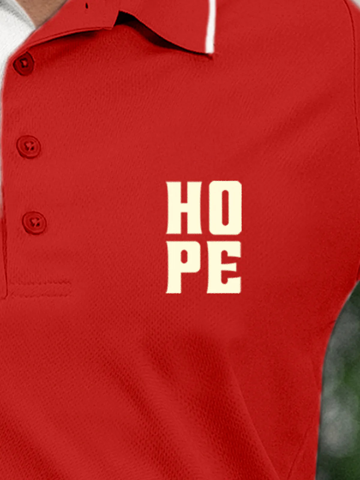 Close up of 'Hope' on Women's Red Polo T-shirt, highlighting intricate details and vibrant print.