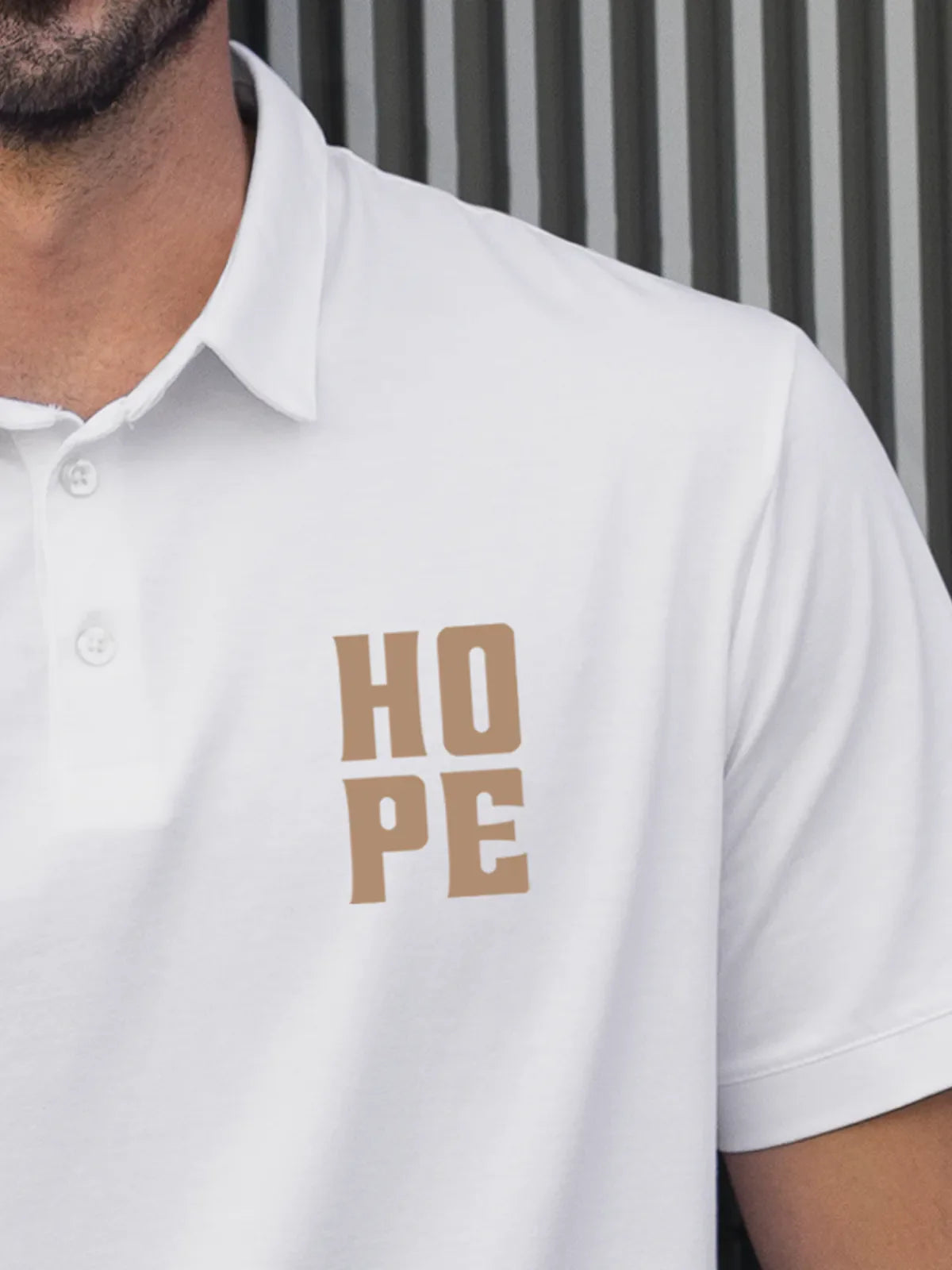 Close up of 'Hope' on Men's White Polo T-shirt, highlighting intricate details and vibrant print.