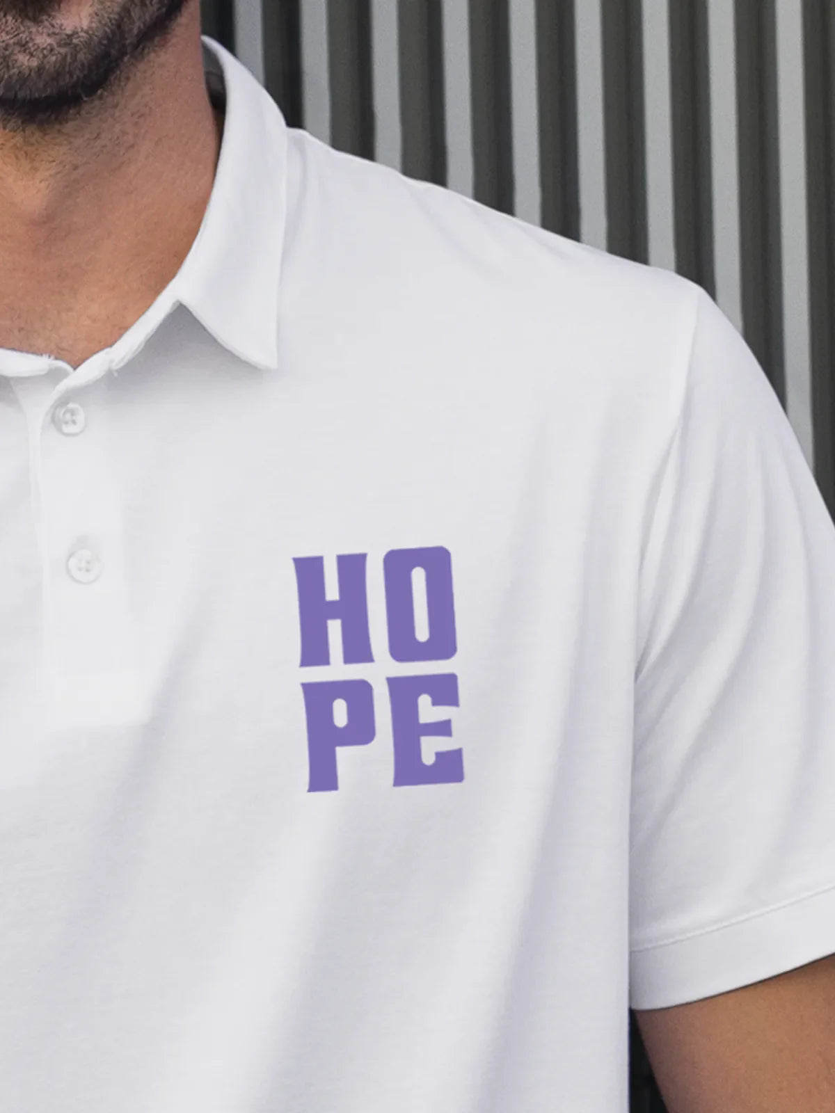 Close up of 'Hope' on Men's White Polo T-shirt, highlighting intricate details and vibrant print.