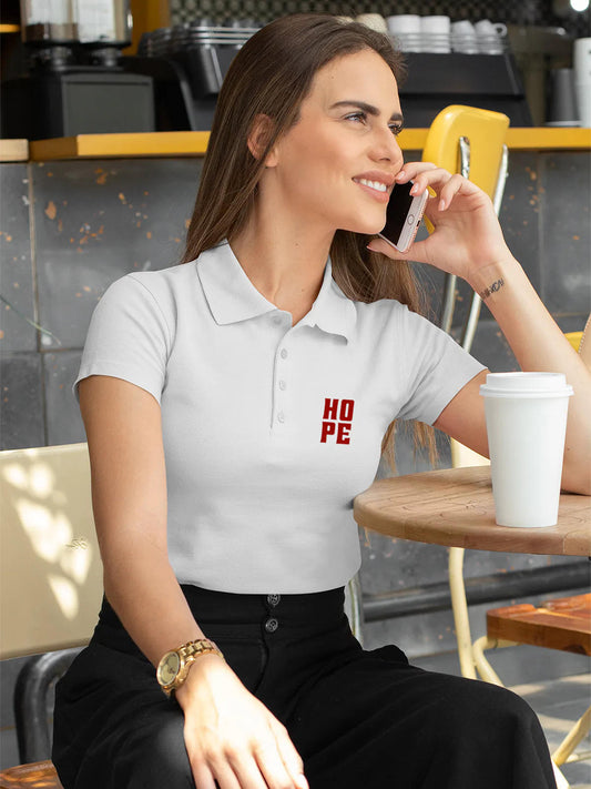 Model wearing Women's White Polo T-shirt with 'Hope' design, offering effortless style and premium comfort