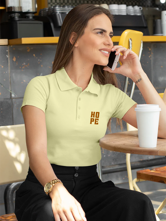 Fighterhero Polos: Model wearing Women's Yellow Polo T-shirt with 'Hope' design