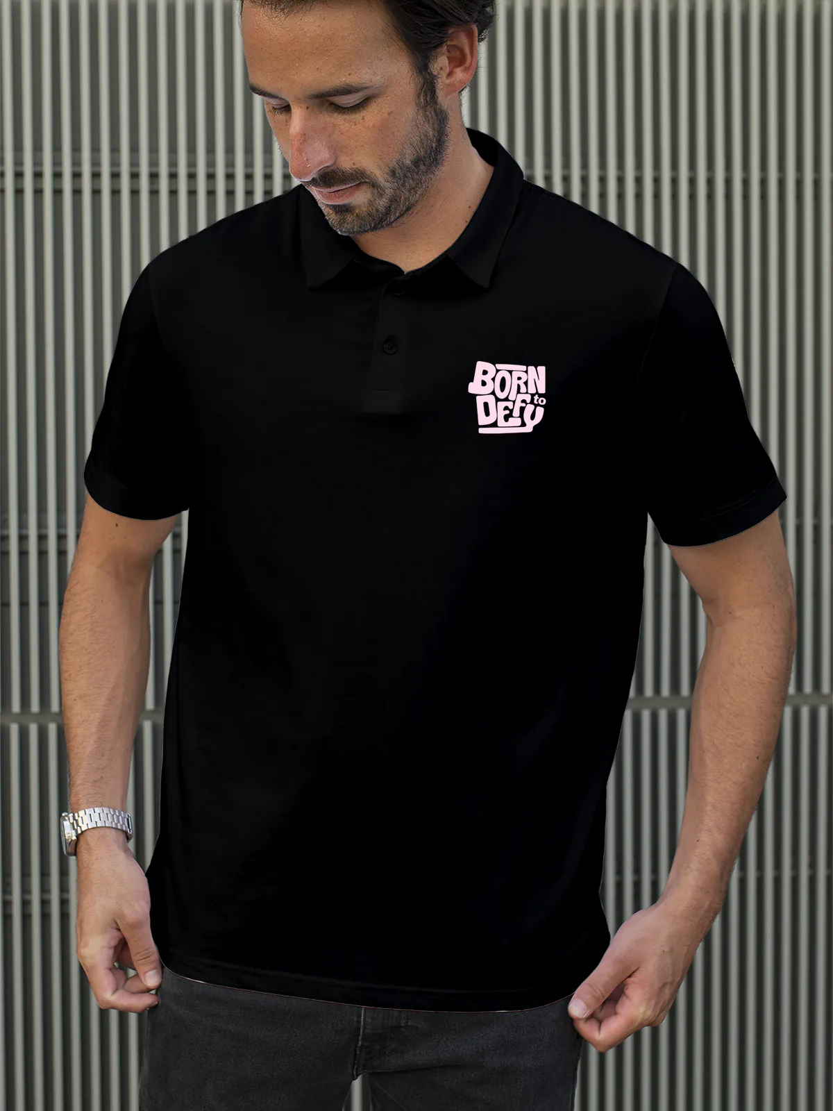 Model wearing Men's Black Polo T-shirt with Born To Defy, offering effortless style and premium comfort