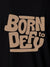 Close up of 'Born To Defy' design on Women's Black Polo T-shirt, highlighting intricate details and vibrant print.