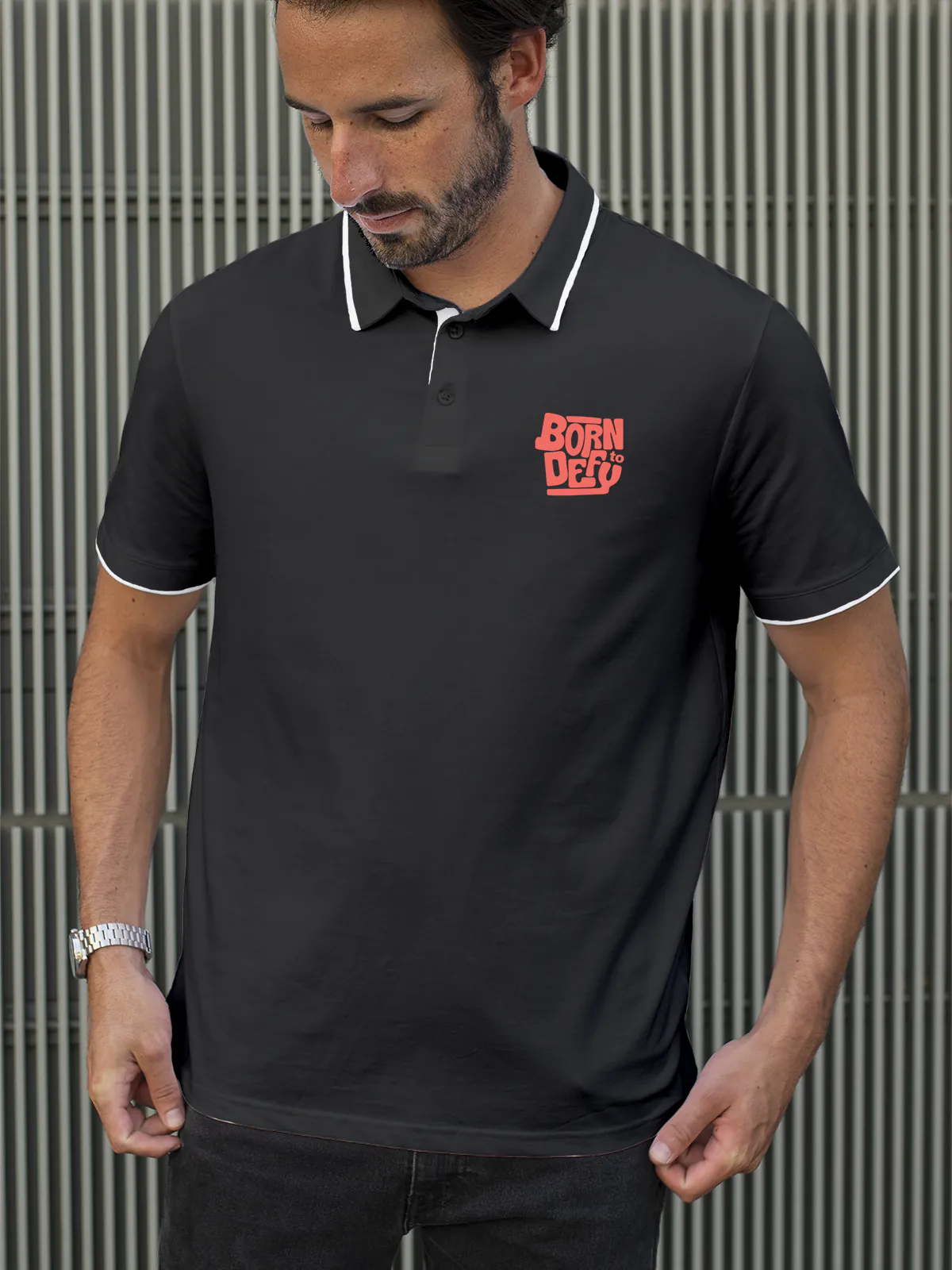 Model wearing Men's Dark Grey Polo T-shirt with Born To Defy, offering effortless style and premium comfort