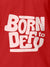Close up of 'Born To Defy' design on Men's Red Polo T-shirt, highlighting intricate details and vibrant print.