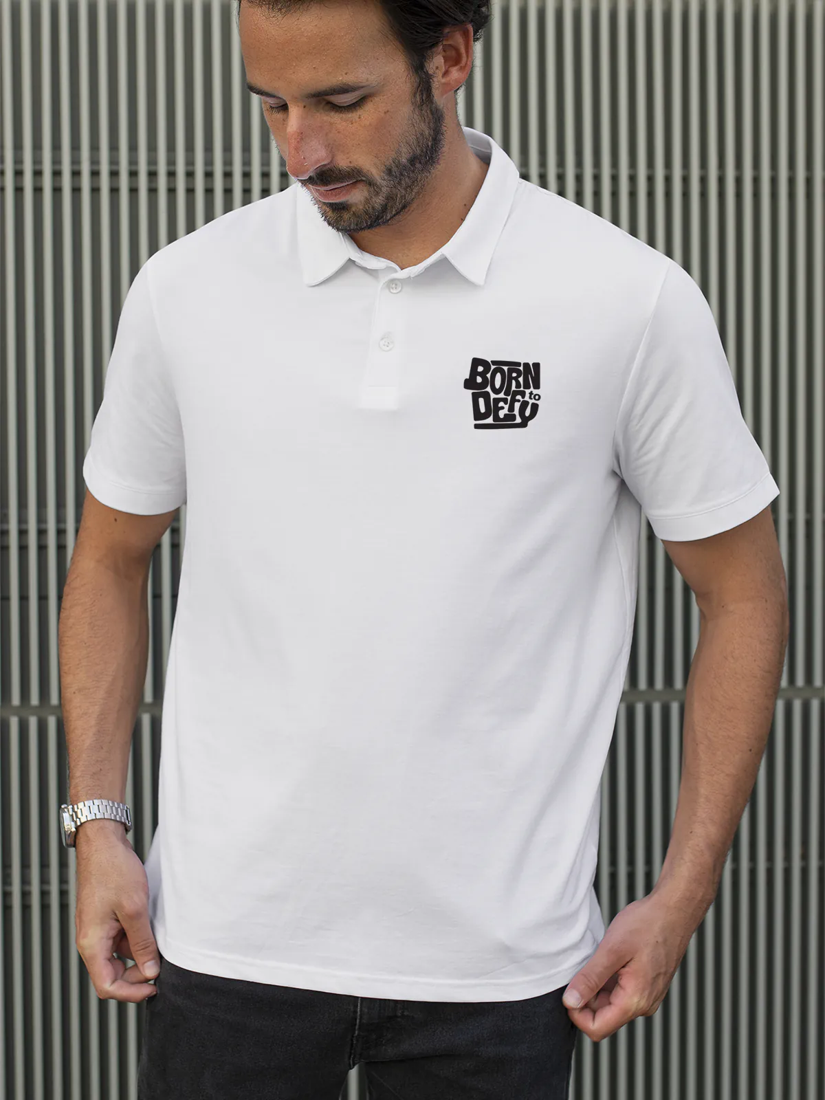 Model wearing Men's White Polo T-shirt with Born To Defy, offering effortless style and premium comfort