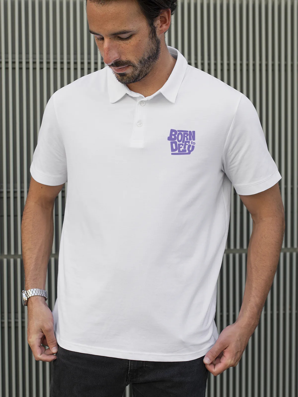 Model wearing Men's White Polo T-shirt with Born To Defy, offering effortless style and premium comfort