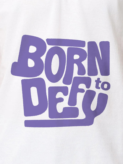 Close up of 'Born To Defy' design on Men's White Polo T-shirt, highlighting intricate details and vibrant print.