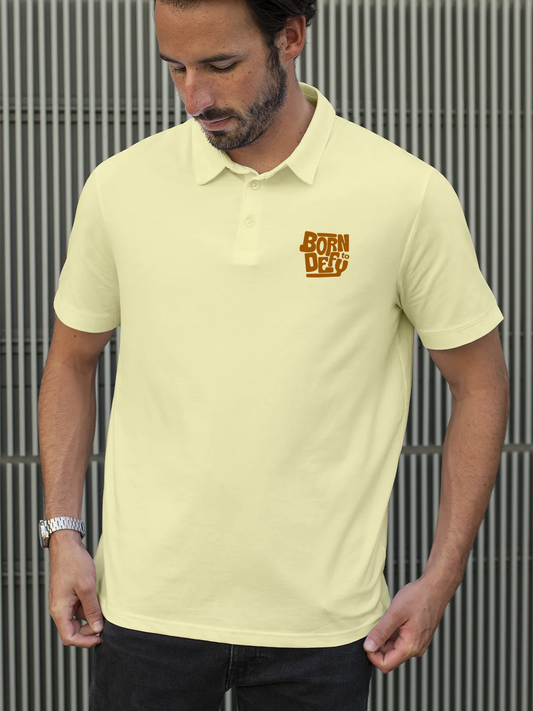 Fighterhero Polos: Model wearing Men's Yellow Polo T-shirt with 'Born To Defy' design