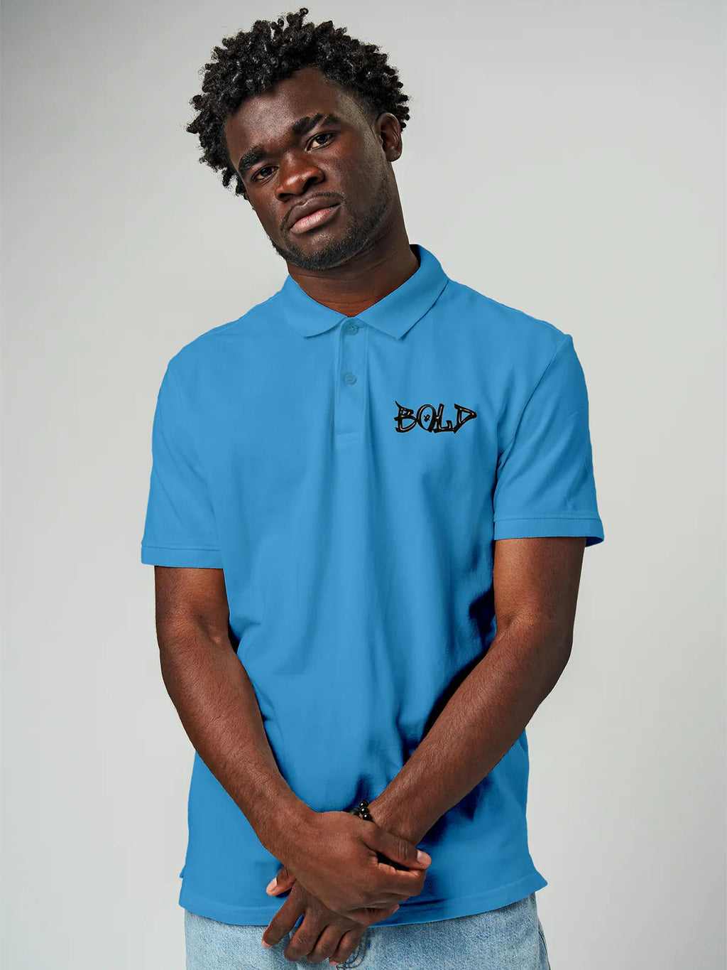 Model wearing Men's Blue Polo T-shirt with Bold, offering effortless style and premium comfort